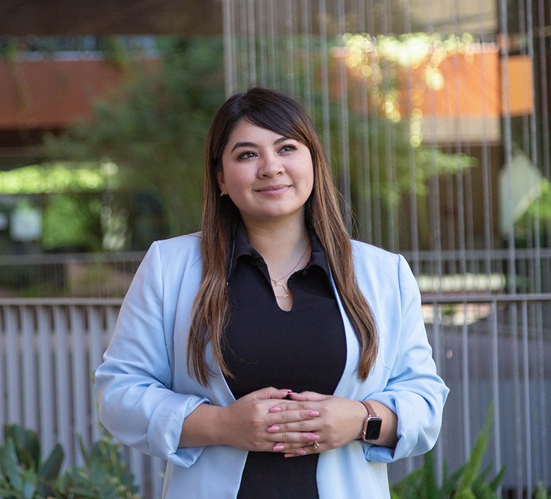 Aliento's founder, Reyna Montoya, smiles as she considers how life-changing DACA has been for many Dreamers on the 10-Year DACA Anniversary.
