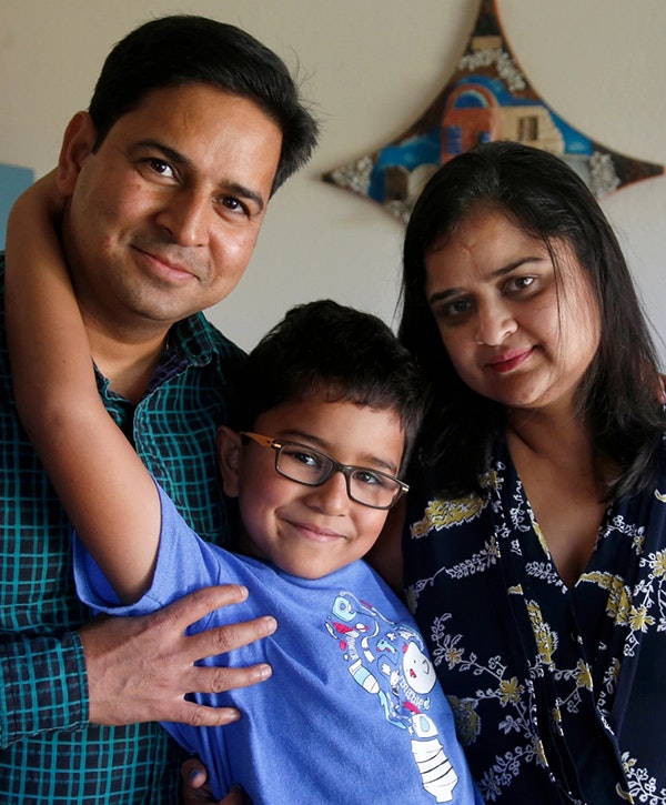 A photo of Kriti, an H-4 visa holder, with her husband and son.