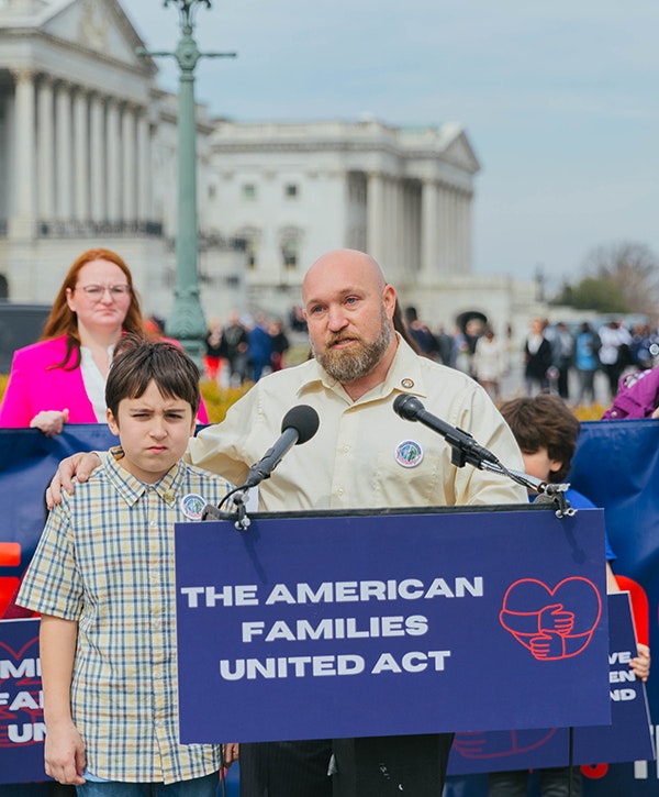 Jason Rochester and his son Ashton share their story at a press conference at the U.S. Capitol