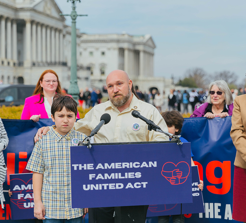 Jason Rochester and his son Ashton share their story at a press conference at the U.S. Capitol