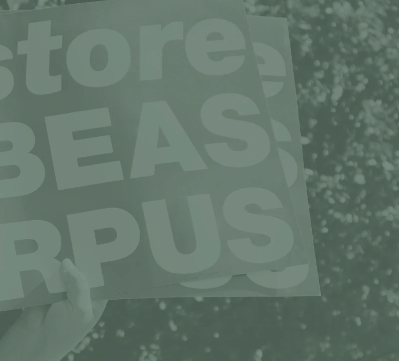 Sign that says Restore HABEAS CORPUS